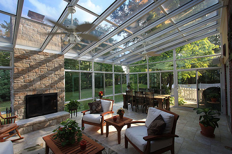 Four Seasons Sunroom with glass ceiling and nice dining area.